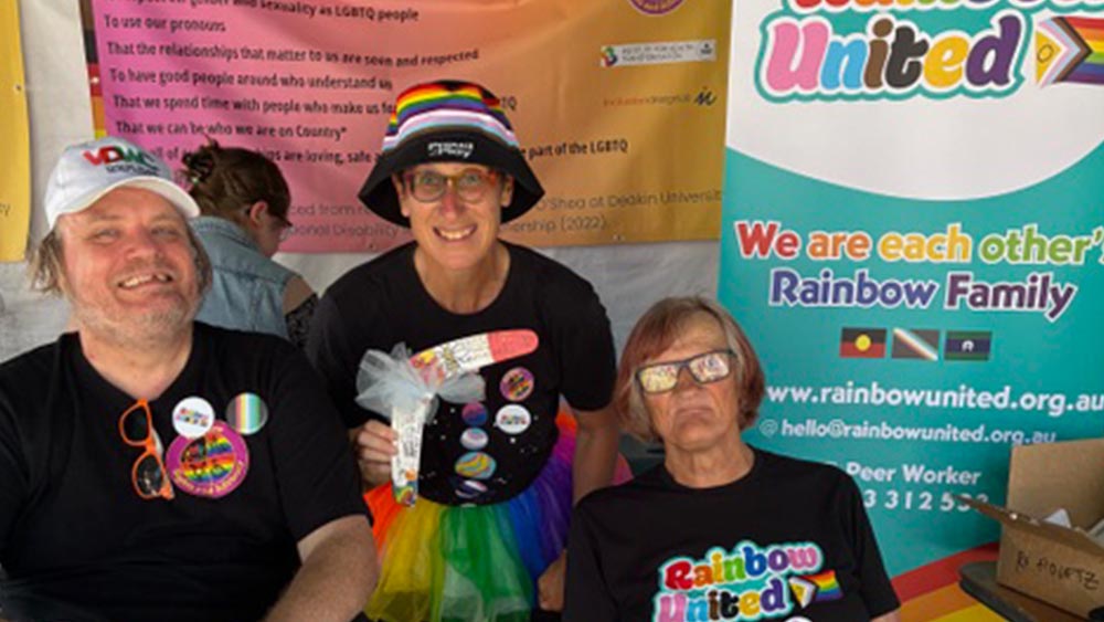 Rainbow united members with their stall at Midsumma Carnival