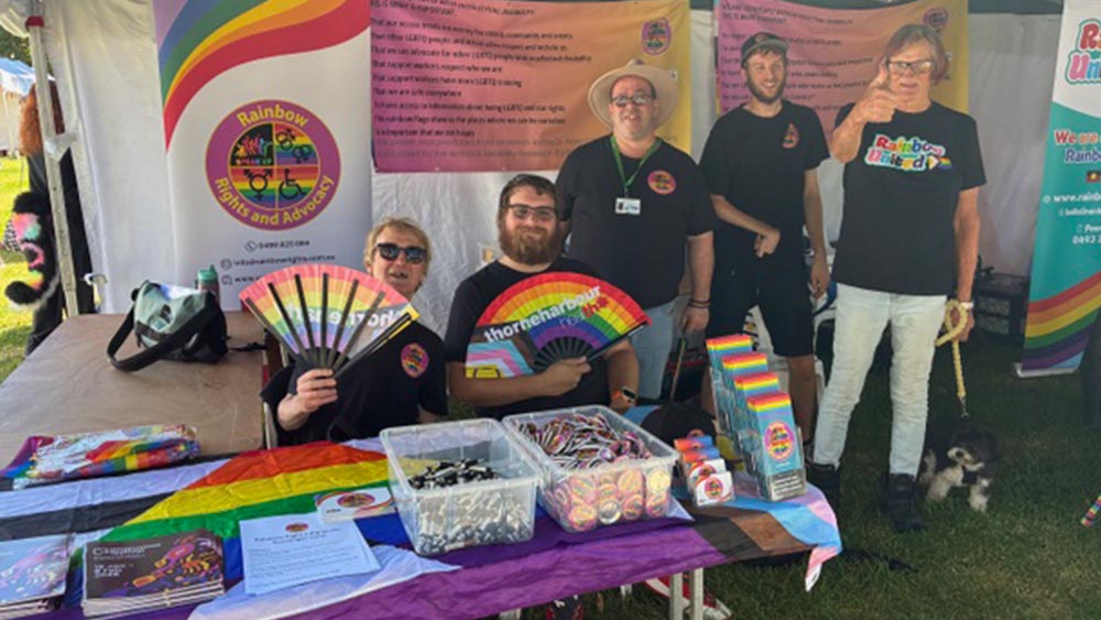 Rainbow united members with their stall at Midsumma Carnival
